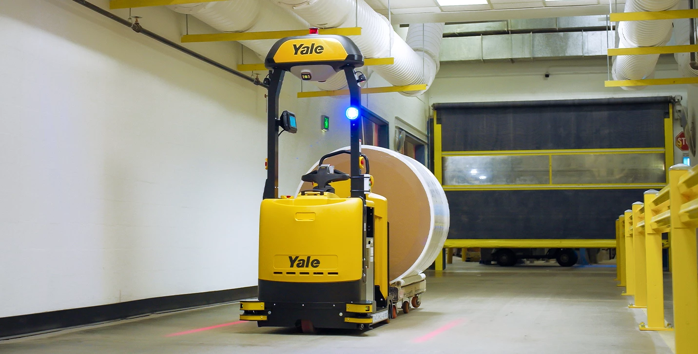 Yale Relay automated tow tractor transporting materials. 